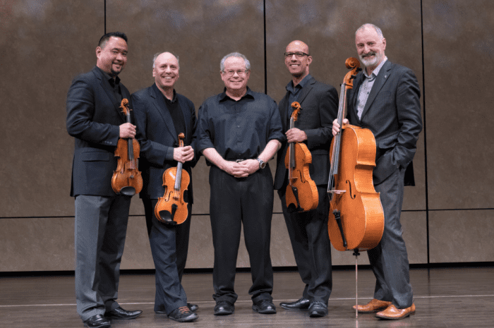 The Alexander String Quartet and Robert Greenberg pose with instruments.