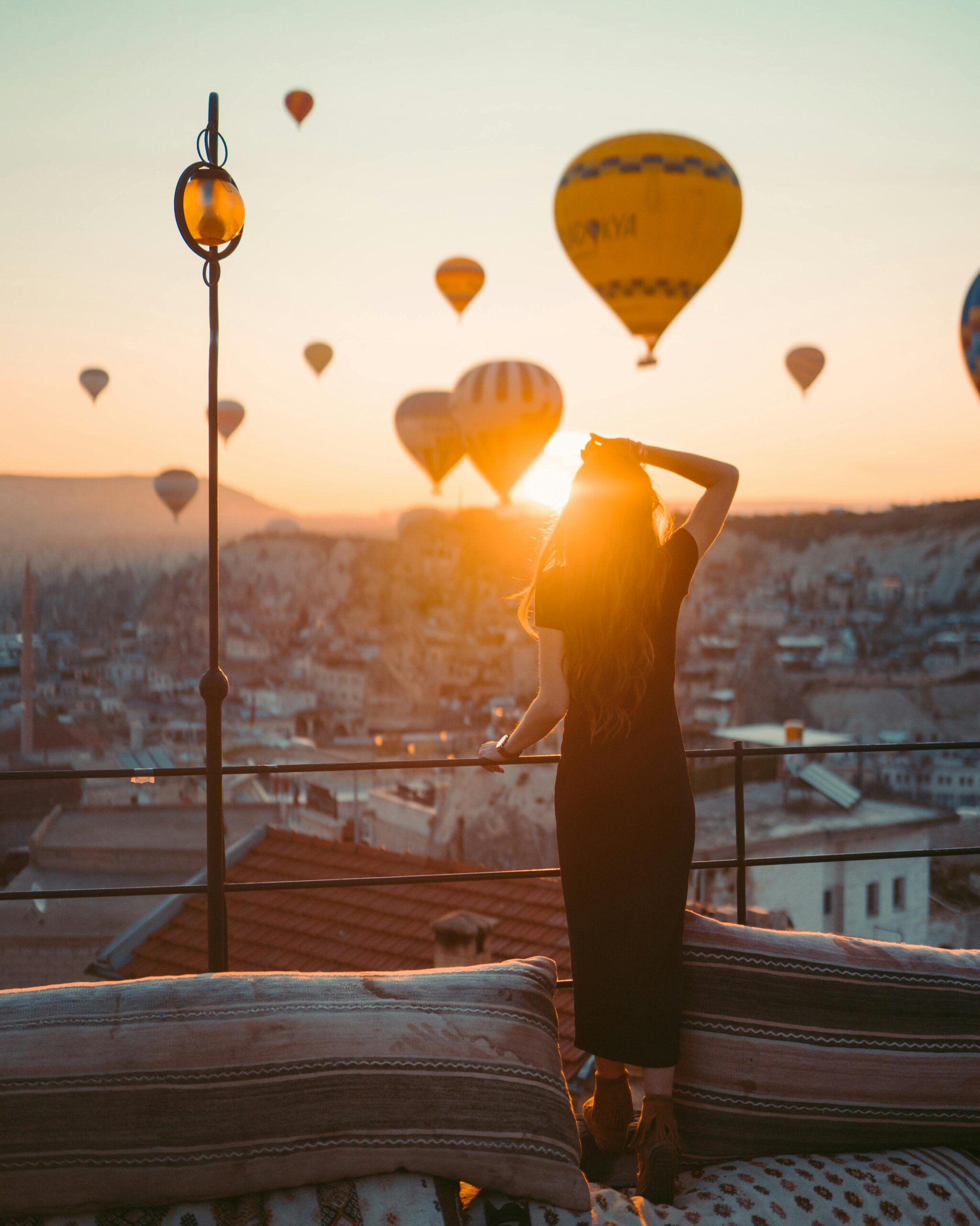 woman by hot air balloons